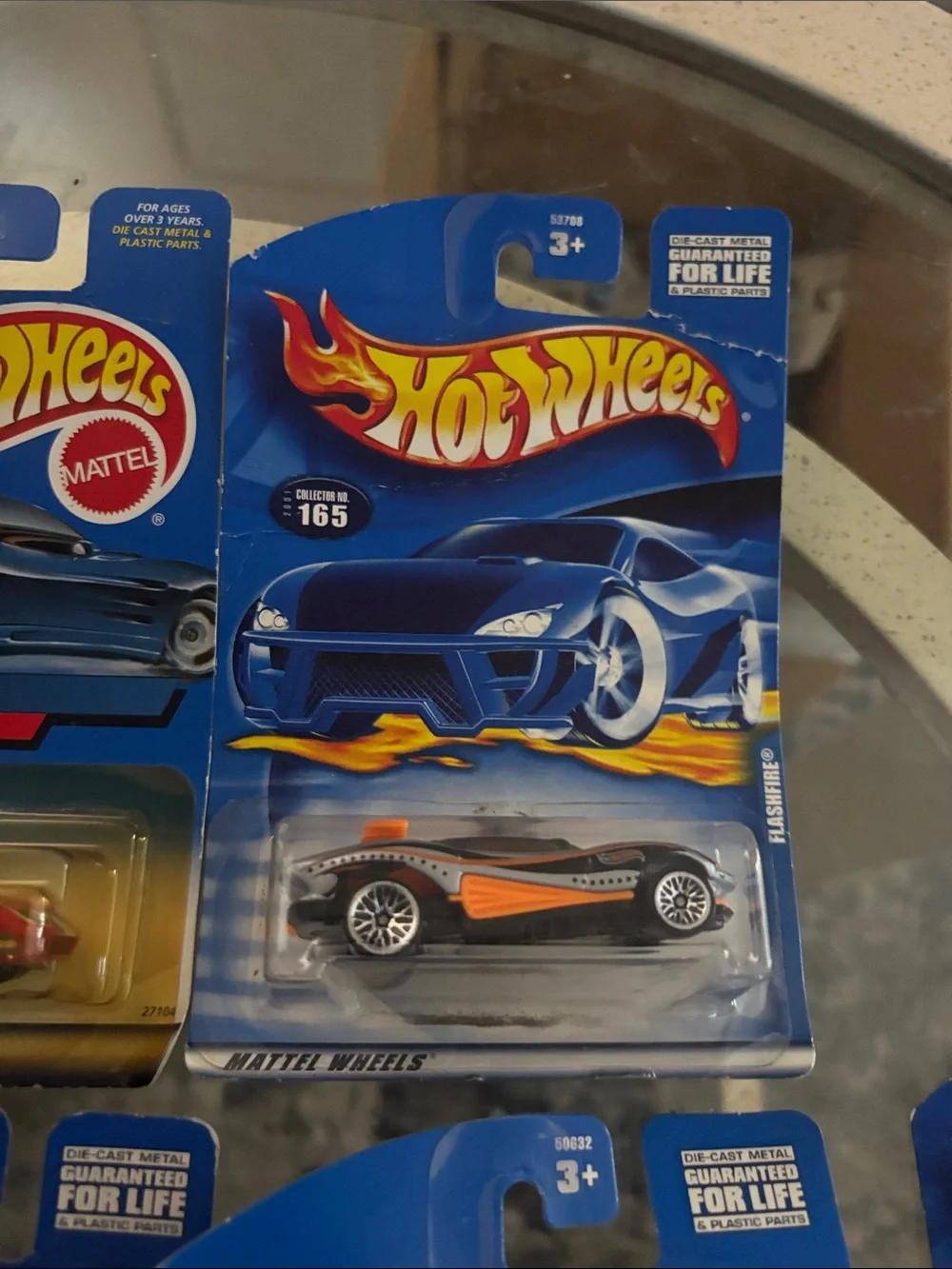 10 Hot Wheels cars in packaging